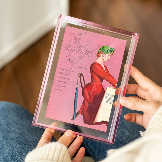 Sakura Pink acrylic floating frame held in hand