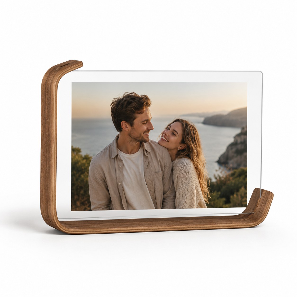 Curved clear tabletop photo frame in walnut wood finish, horizontal orientation