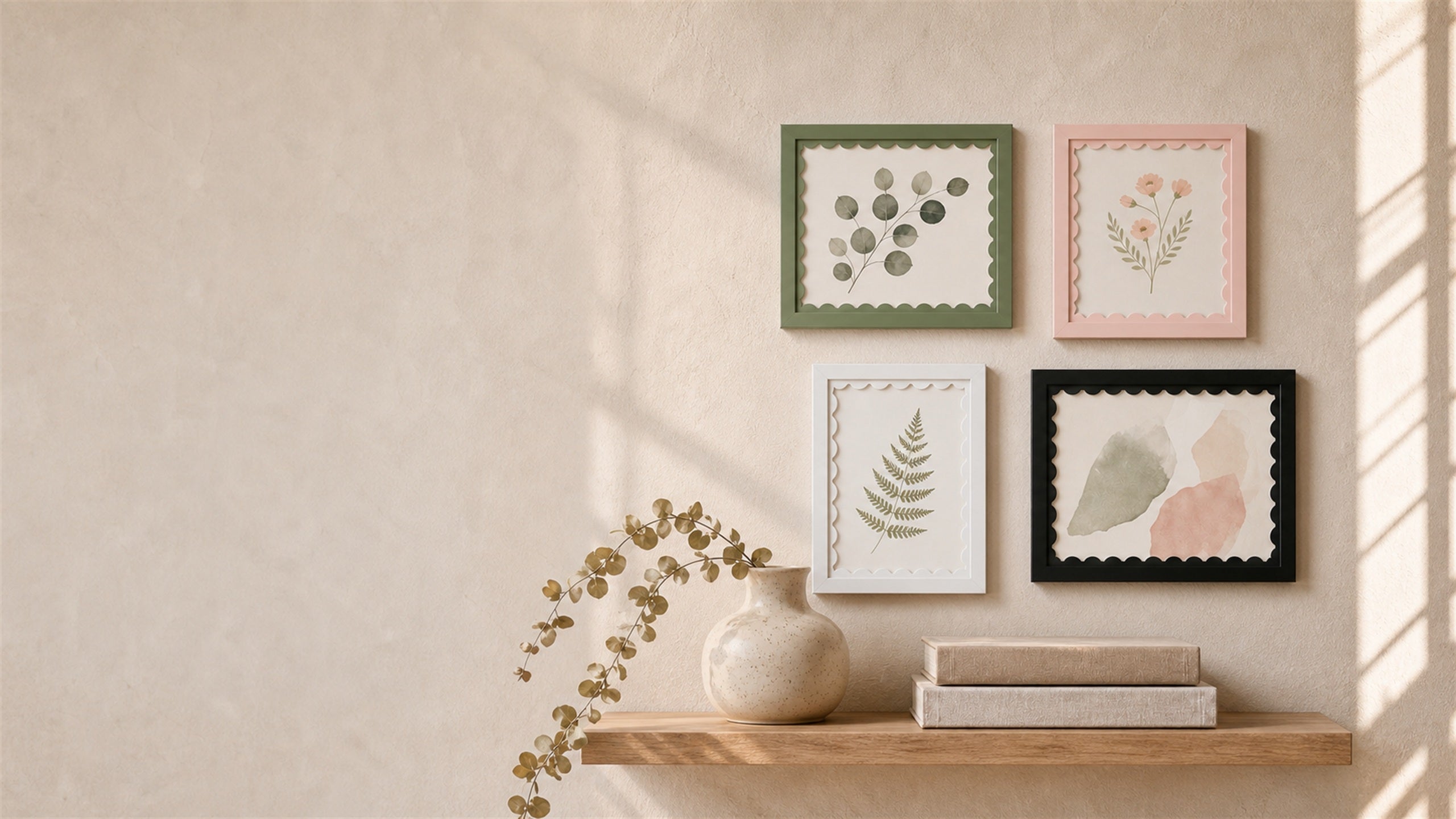 Scalloped-mat art frames styled on a warm gallery wall