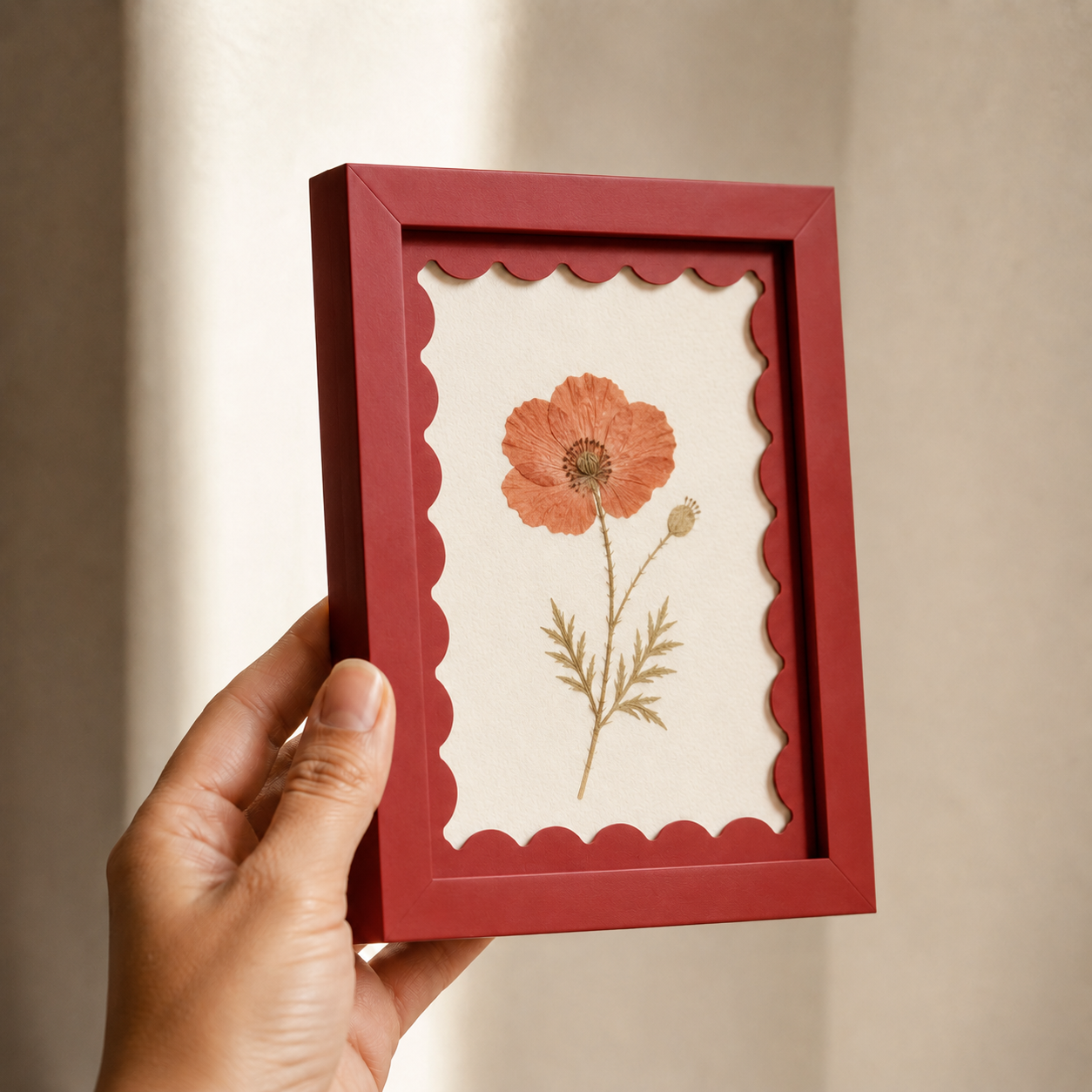 Red scalloped-mat art frame, angle view